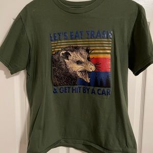 Graphic tee. “Let’s eat trash and get hit by a car”. Size small